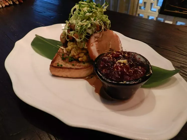 Chef Richard Hales honors Thanksgiving with his Texas toast open-faced turkey sandwich. - COURTESY OF BIRD & BONE