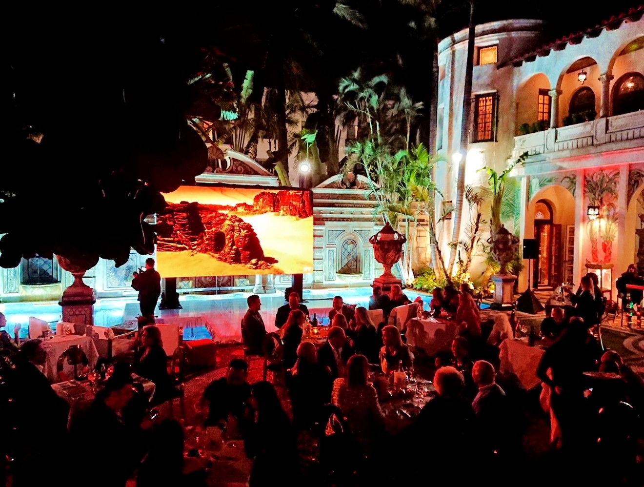 Poolside viewing party at Villa Casa Casuarina.