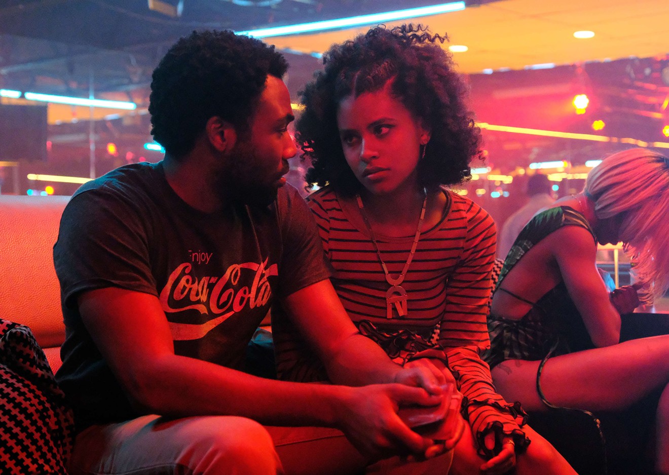 Donald Glover (left) plays Earn, struggling to makes ends meet as a young father and trying to please Van (Zazie Beetz), the mother of his young child, while also managing a rising rapper who happens to be his cousin in Atlanta.