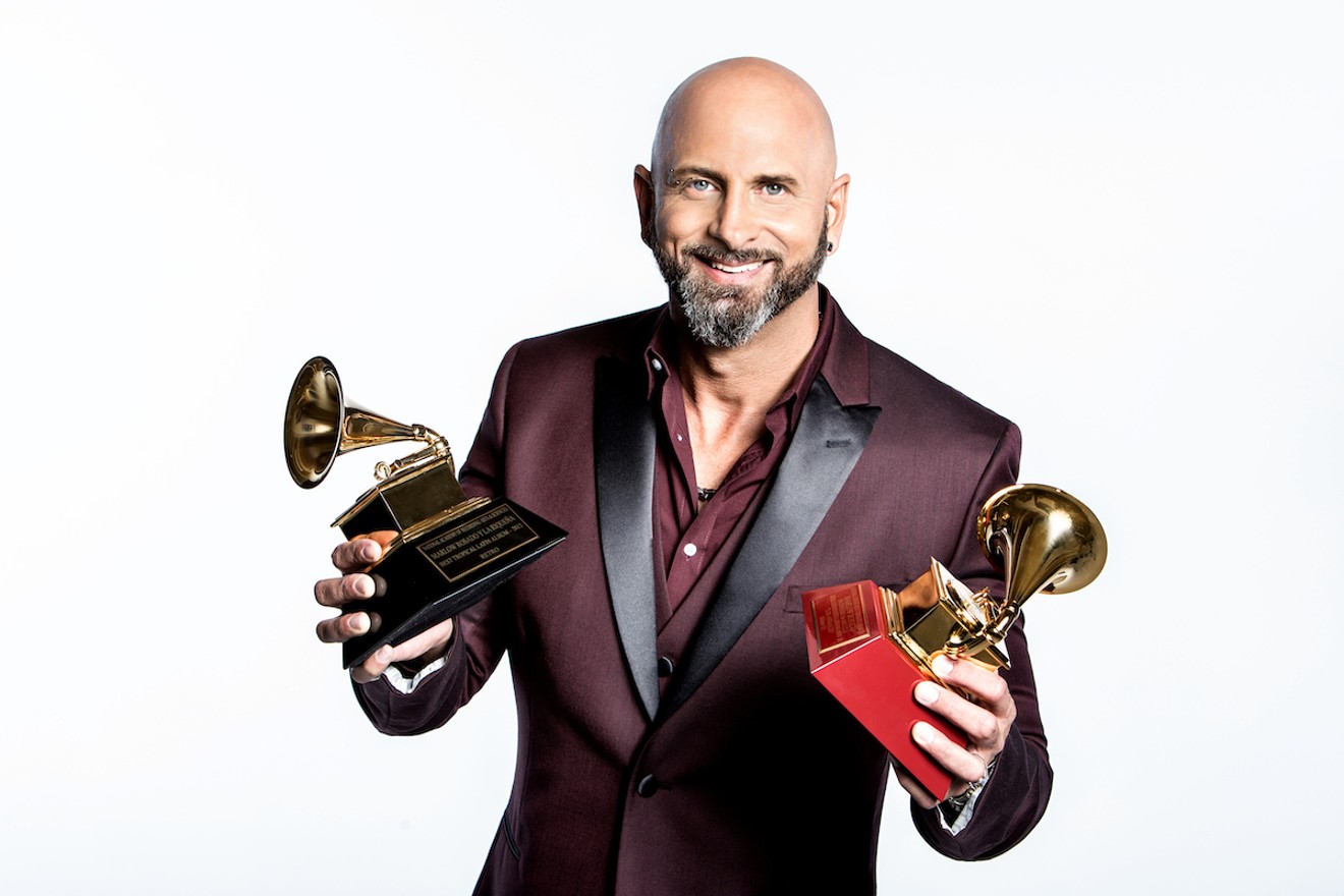 Marlow Rosado, seen here with his Grammy and Latin Grammy awards, is promoting two new albums, both born during the coronavirus lockdown.