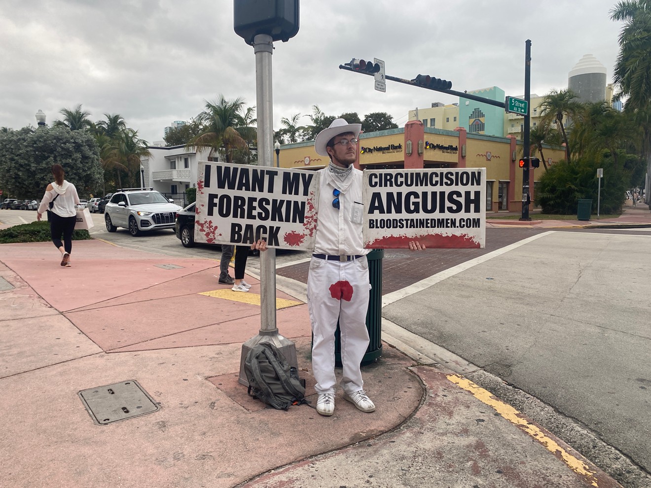 Bloodstained Men president David Atkinson protests circumcision in Miami Beach.