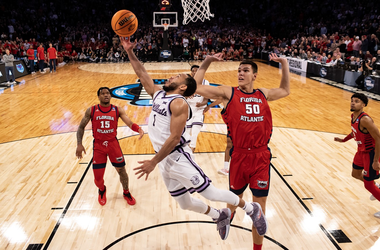 Markquis Nowell of the Kansas State Wildcats goes to the hoop against Vladislav Goldin of the FAU Owls in the NCAA Men's Basketball Tournament on March 25, 2023 in New York City.