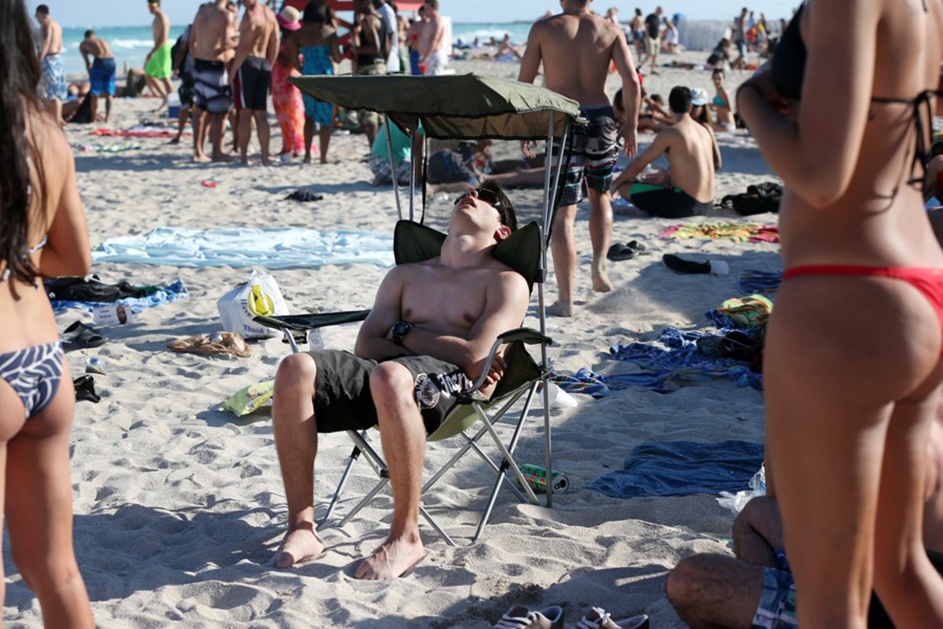 A spring breaker in repose, ten minutes before his face will be covered in phallic Sharpie markings.