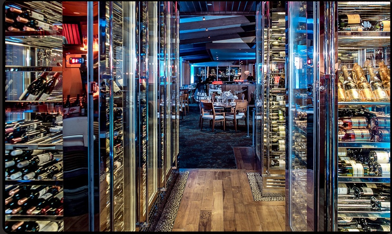 More than 300 bottles on display in the glass cube cellar at the restaurant's entrance.