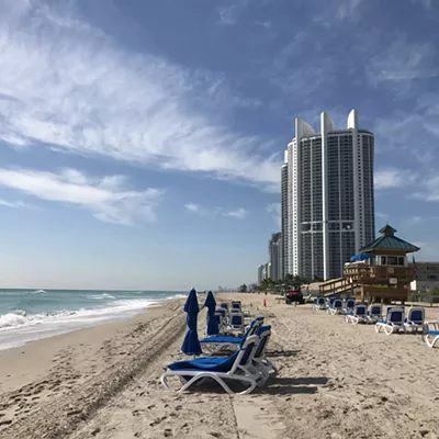 The Trump International Beach Resort overlooks the sand in Sunny Isles Beach.