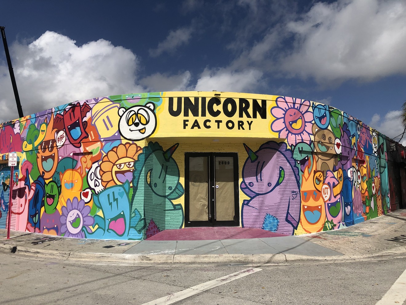 The exterior of the almost-open Unicorn Factory.