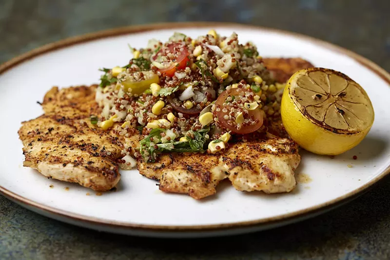 Image: Chicken paillard with quinoa salad at Vista, an Italian/South American/American restaurant that anchors the complex.