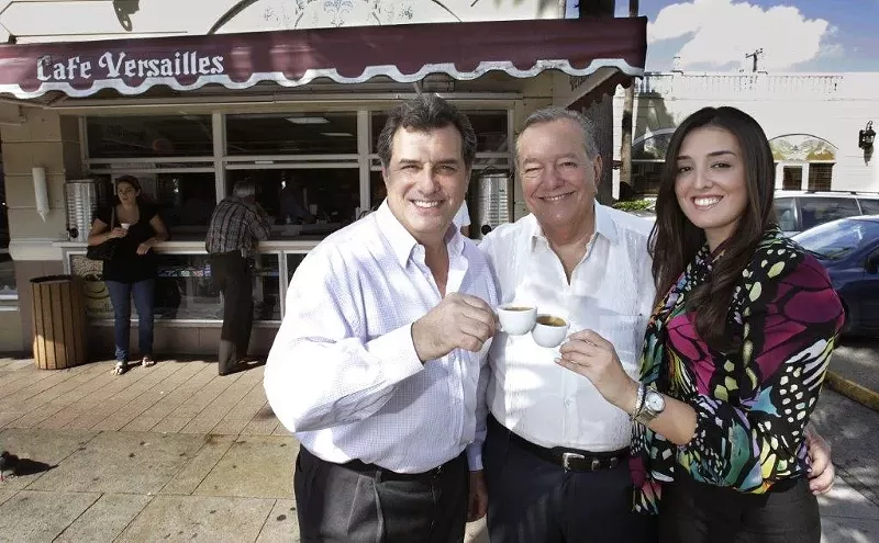 Image: Felipe Valls, Sr. (center), with Felipe Valls, Jr. (left) and Nicole Valls (right)