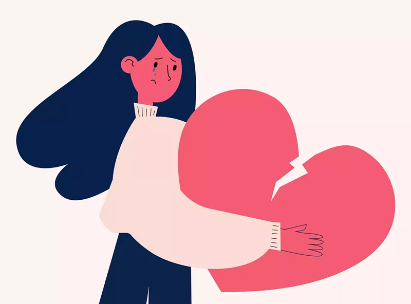 Image: Illustration of woman hold a broken heart
