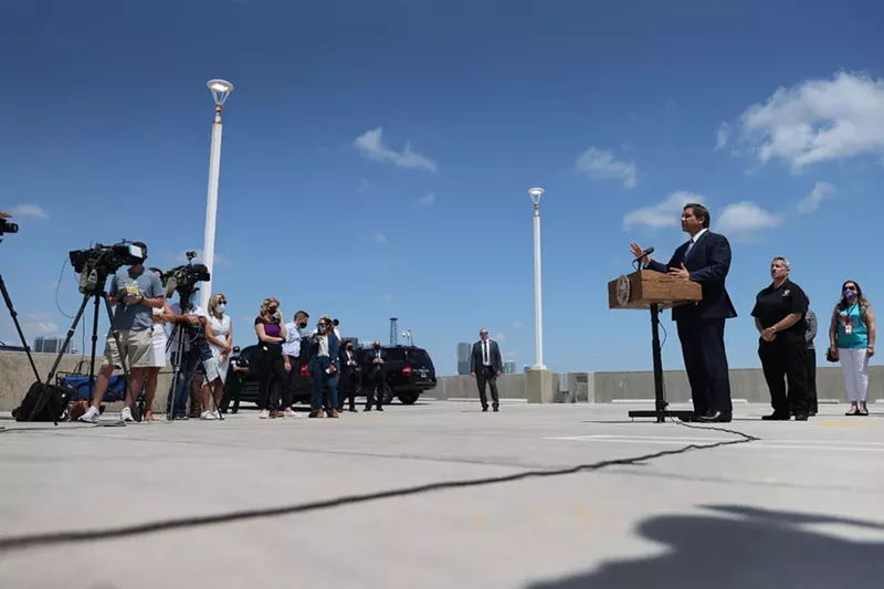 Image: Florida Gov. Ron DeSantis speaks to the media about the cruise industry during an April 8 press conference at PortMiami.