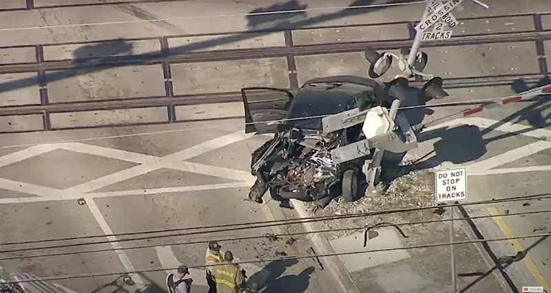 Image: A wrecked car that was just hit by a Brightline train.