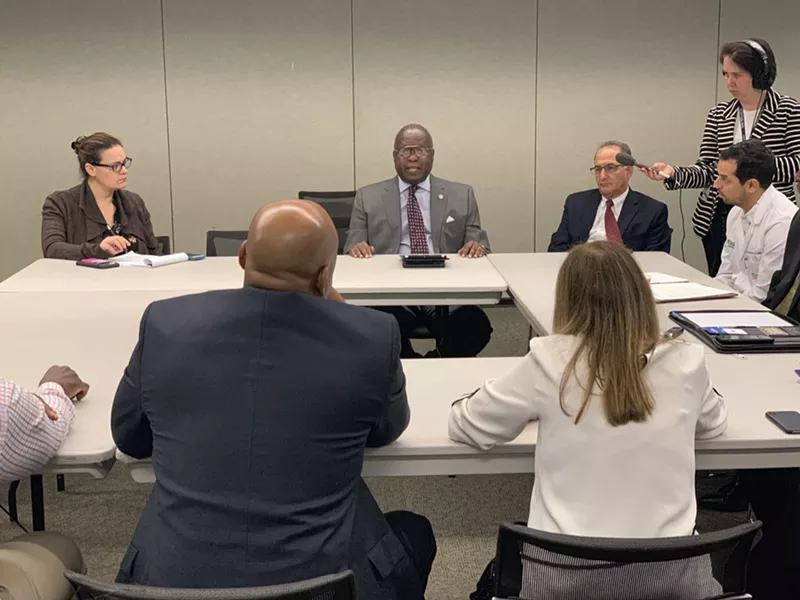 Image: City of Miami Human Services director Milton Vickers (center)
