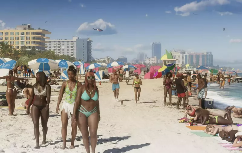 Image: Screenshot of the trailer for Grand Theft Auto 6, showing a crowd of buff, swimsuit-clad people enjoying the sunny shores of Miami's South Beach.