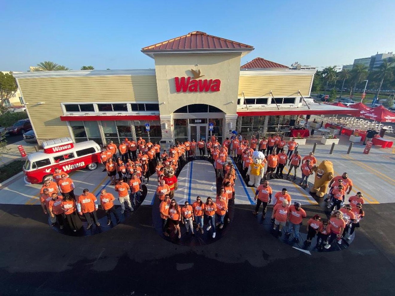 Aerial photo of Wawa employees, customers, and community partners spelling out "305" outside the new Doral location.