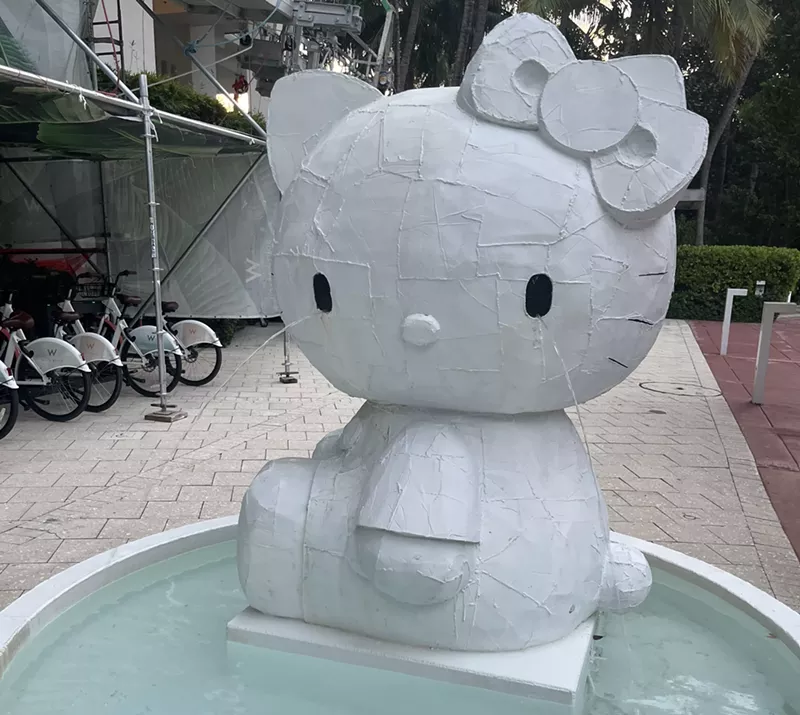 Image: a Hello Kitty fountain with water pouring out of its eyes