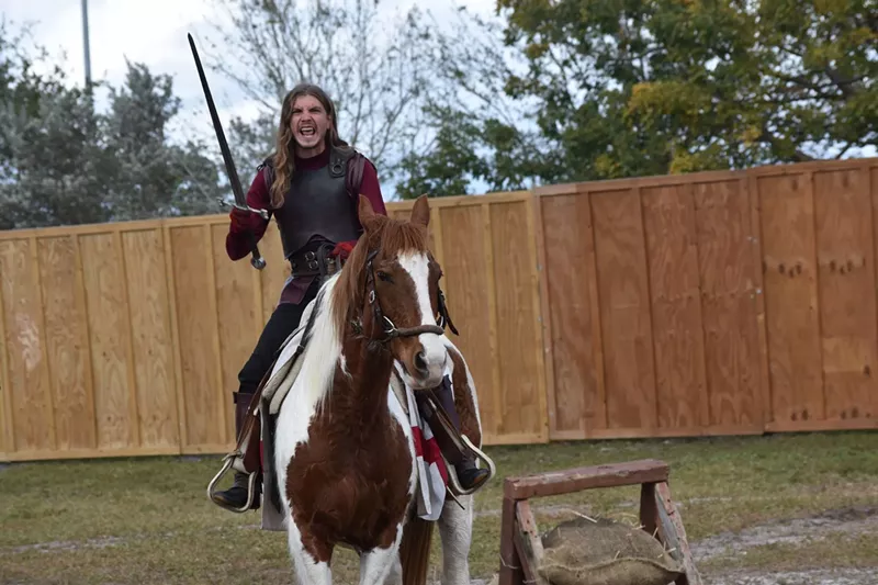 Image: Jouster Caleb Austin Jordan riding atop a horse