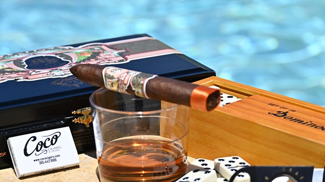 A cigar near a pool