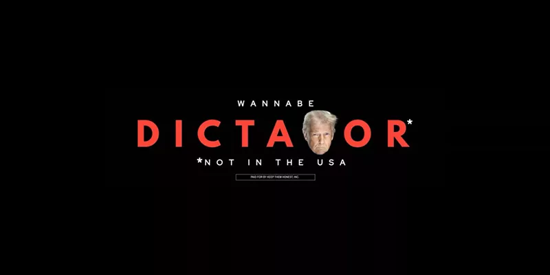 Image: A billboard calls President Donald Trump a "Wannabe Dictator" with a photo of Trump as the second "t".