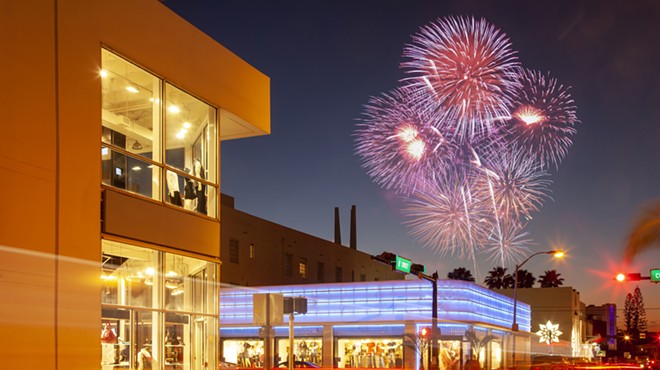 color photo of fireworks over buildings in Miami Beach, Florida.
