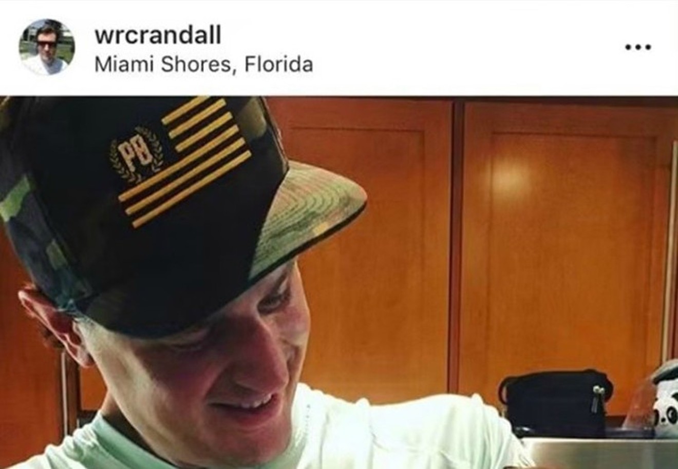 A screenshot of a now-deleted Instagram post showing Crandall wearing a hat with the Proud Boys' logo.