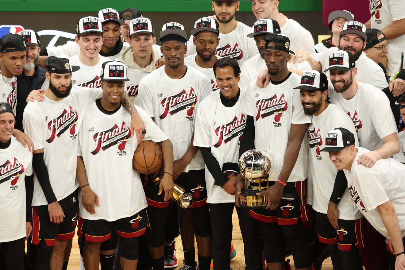 The Miami Heat pose with the Bob Cousy Trophy after defeating the Boston Celtics 103-84 in the Eastern Conference Finals on May 29, 2023, in Boston.