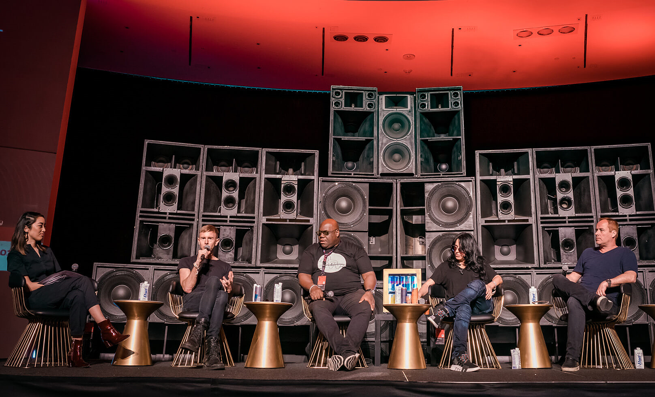Carl Cox (center) sits on a panel at Winter Music Conference 2019.