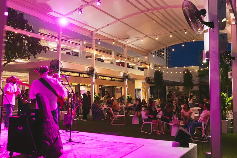 Image: The Backyard at the Doral Yard consists of 15,000 square feet of bars, food trucks, seating, and a stage.