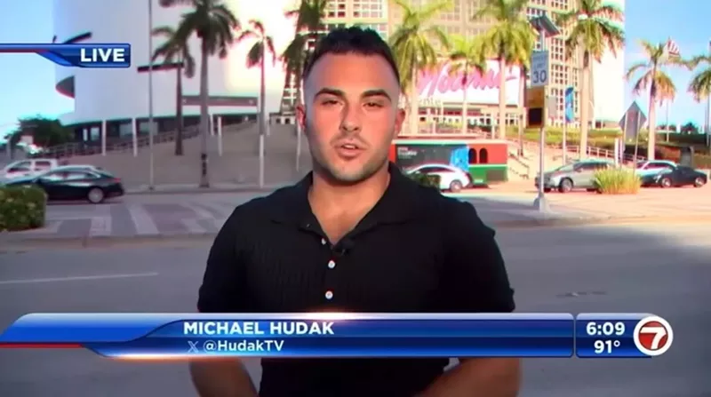 Image: A screenshot of reporter Michael Hudak doing a live broadcast in front of the Kaseya Center in downtown Miami.