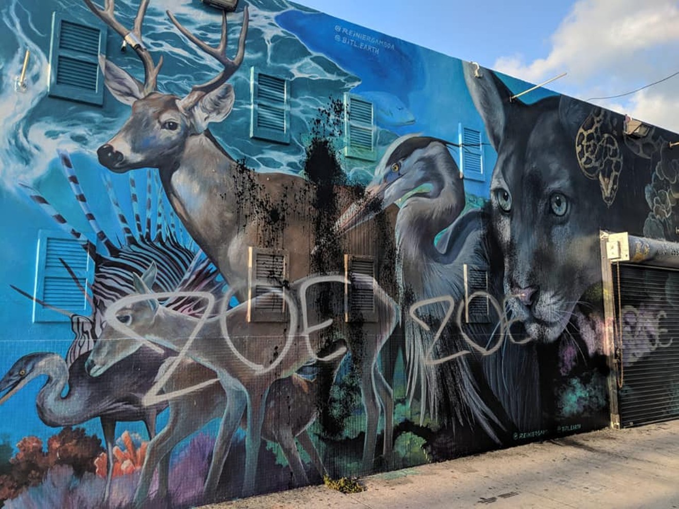 The vandalized mural painted by Miami artist Reinier Gamboa.