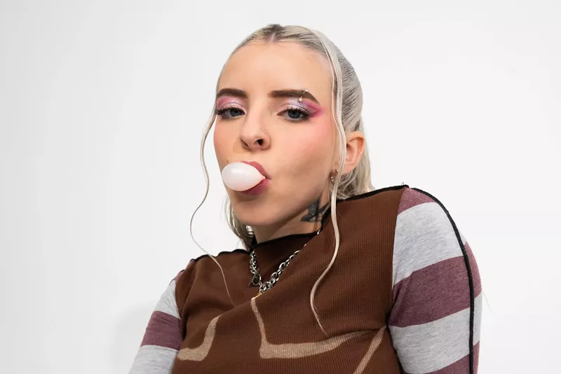 Image: Portrait of Young Miko blowing a bubble from her gum