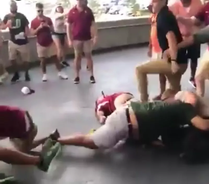 Image: College football fan brawls were in postseason form at FSU-Miami this year.