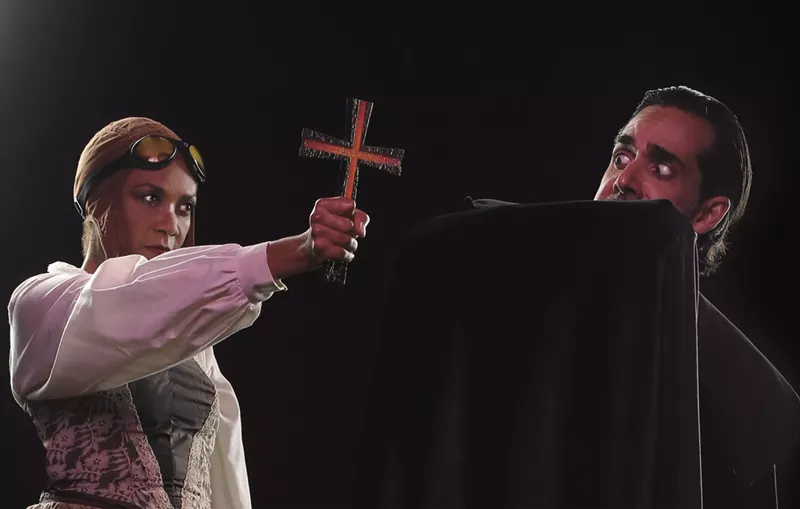Image: The vampire hunter versus the vampire in Zoetic Stage's Dracula.